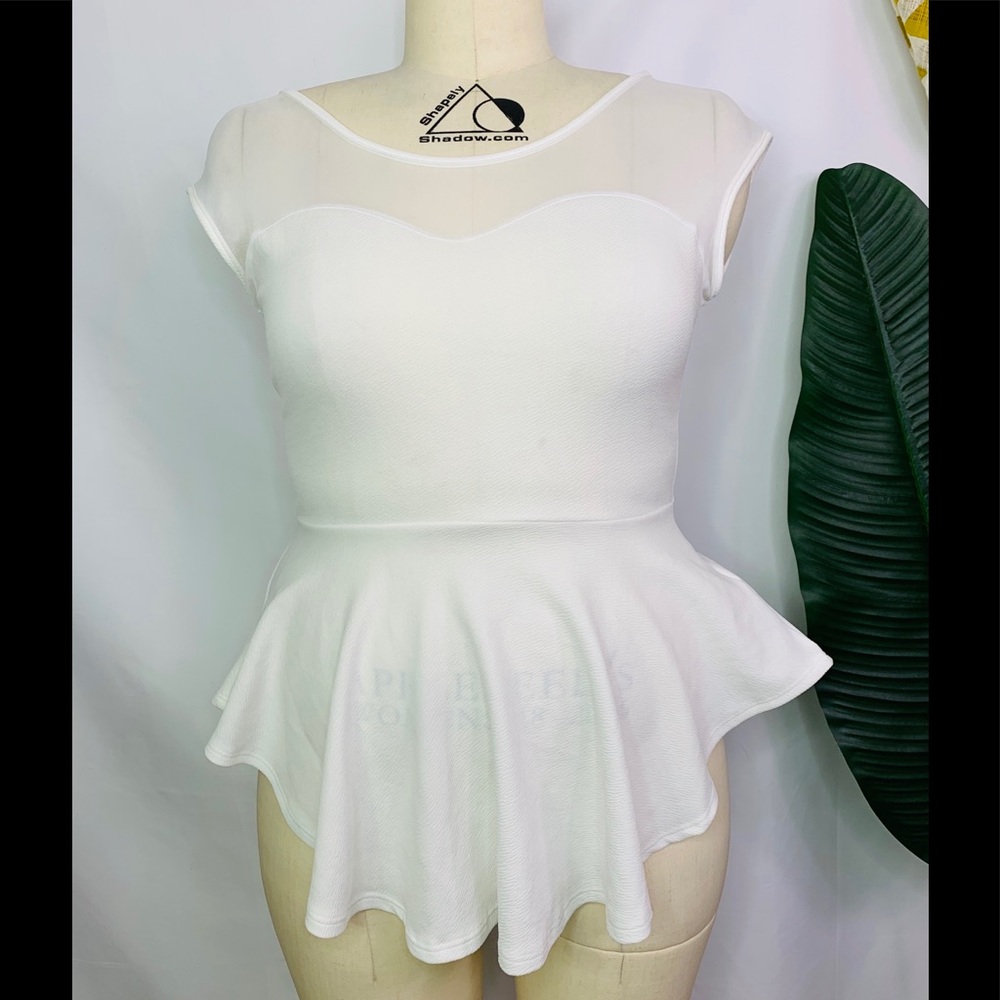 plus size peplum top with sheer bodice